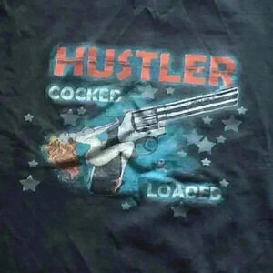 VTG Hustler Black T-shirt with revolver lady sitting on it